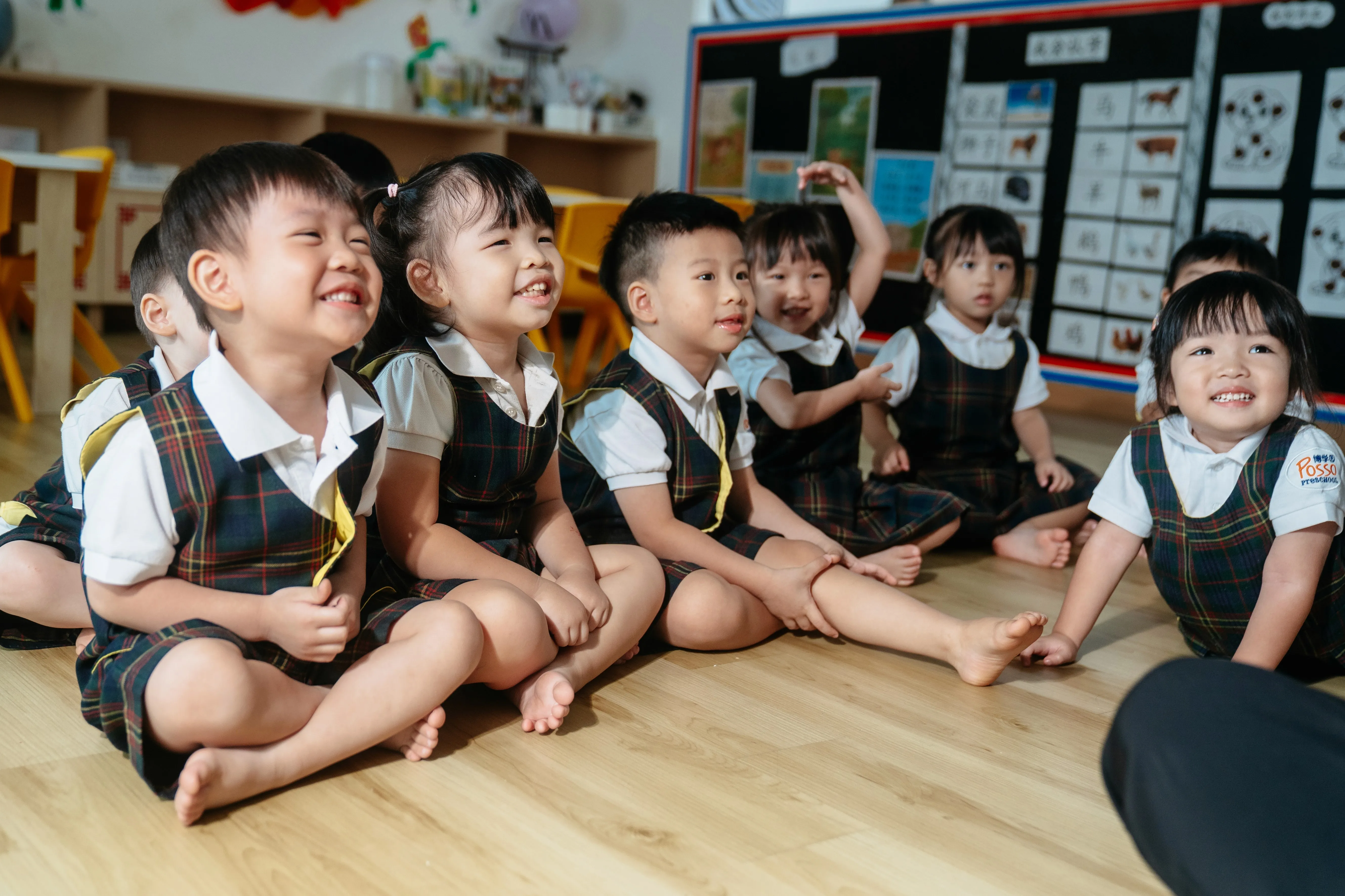 Smiling Posso Preschool children in class