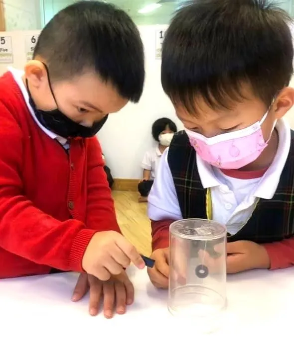 Children doing a science experiment